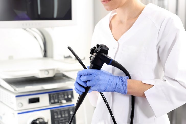 doctor with colonoscopy tools