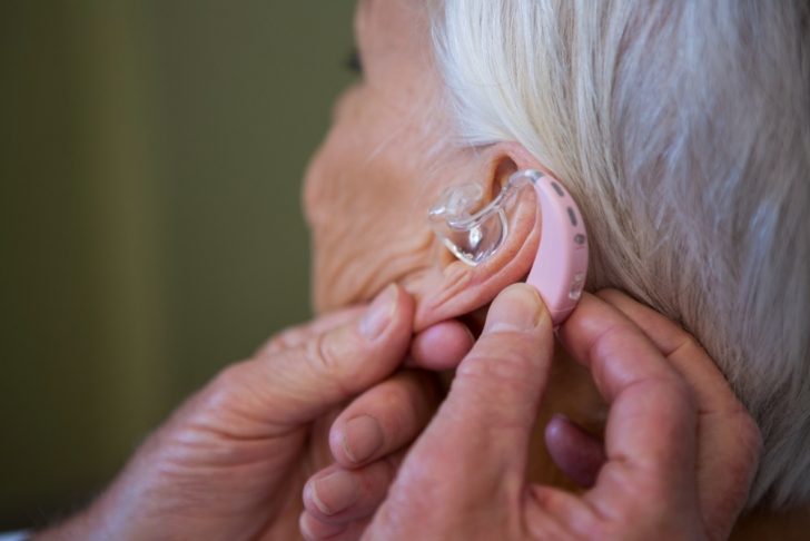 hearing-aid-being-installed