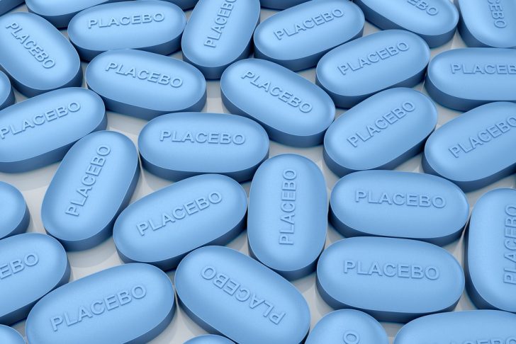 group of blue, labeled placebo pills